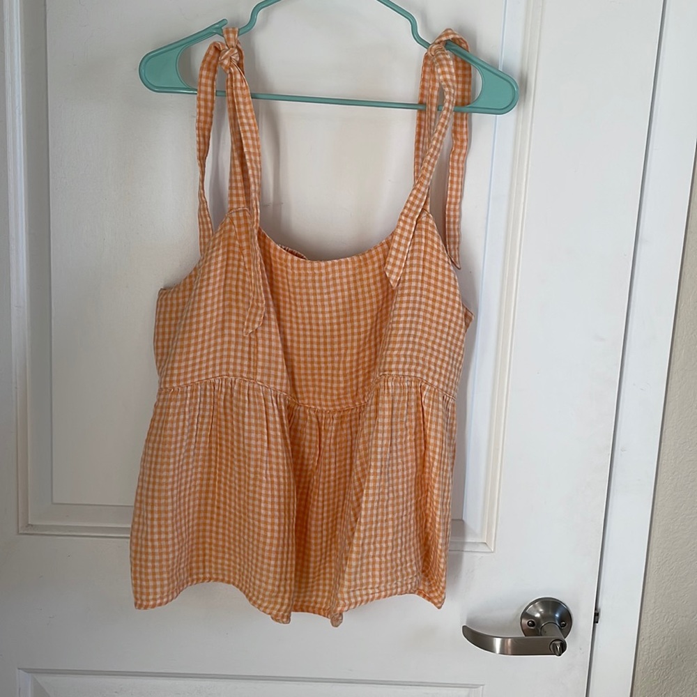 Orange and white checkered tank with shoulder tie sleeve